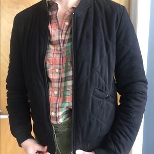 Women’s quilted black bomber jacket